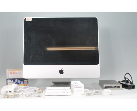 A 2009 model Apple iMac desktop computer in good condition having a 20 inch screen display with a intel core 2 duo, 2.4GHz an