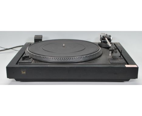 Hi-Fi - A Dual CS 505 - 3 belt drive record player finished in black having a carbon fibre arm. Made in Germany. Sadly miss t