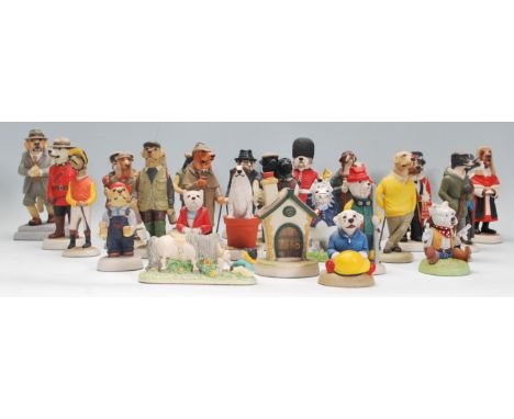 A collection of Robert Harrop ceramic collectable dog figurines to include mostly Country Companions figures all a having man