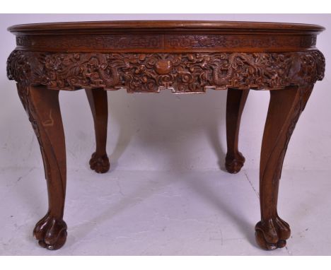 A pair of Anglo Colonial Burmese carved hardwood console hall tables. Each of demi lune ( half moon ) form with shaped legs o