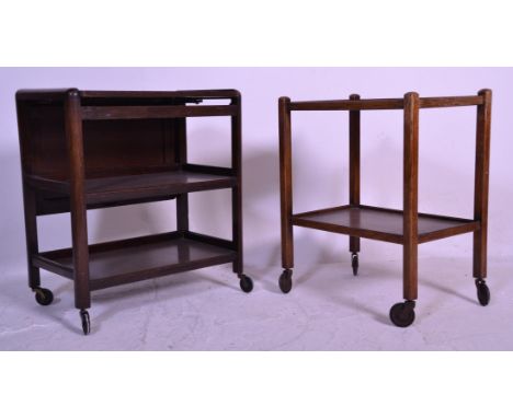 An early 20th Century Art Deco three tier tea trolley of oak construction having a drop leaf swivel top. Together with a 1940