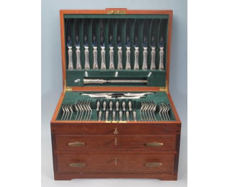 A 20th Century teak wood cutlery canteen with three drawers each having keys being fully appointed with James Dixon and Sons 