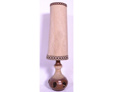 A retro mid 20th century vintage 1960's West German floor fat lava lamp in bulbous form with pearct decoration to the base an