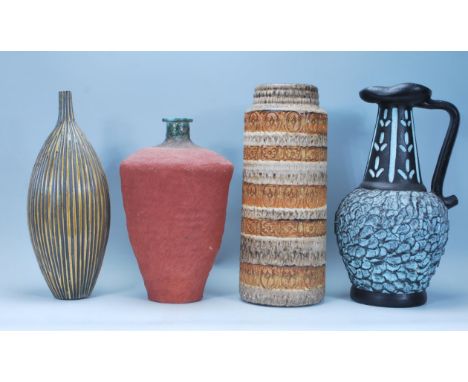 A collection of vintage retro art pottery to include a West German vase having banded decoration, a vase of bulbous form with