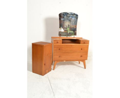 A 1950's retro vintage Golden Key walnut dresing table and bedside cabinet. The dressing table having two drawers with two va