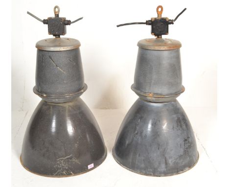A matching pair of large vintage industrial 20th Century factory black enamel ceiling lights. Each retaining the original fix
