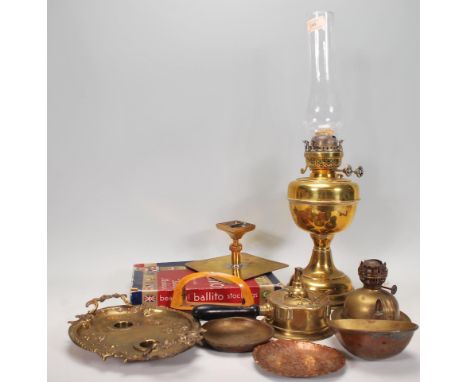 A good collection of 20th century vintage brass items to include an oil lamp, brass oil burners, rococo style brass inkwell a