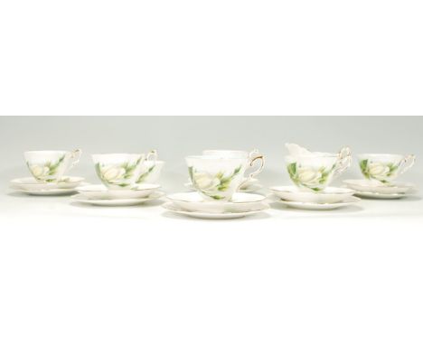 A vintage 20th century Royal Standard '' Virgo '' six persons part tea service to include six cups, six sauces and six plates