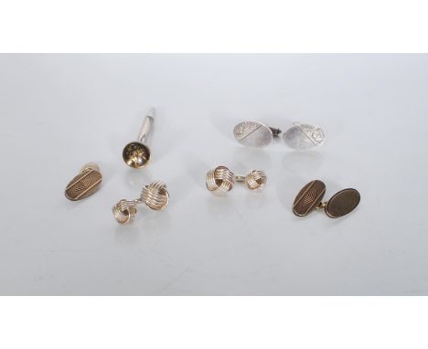 A selection of mens silver cufflinks to include a pair of silver hallmarked oval cufflinks with engraved foliate decoration, 