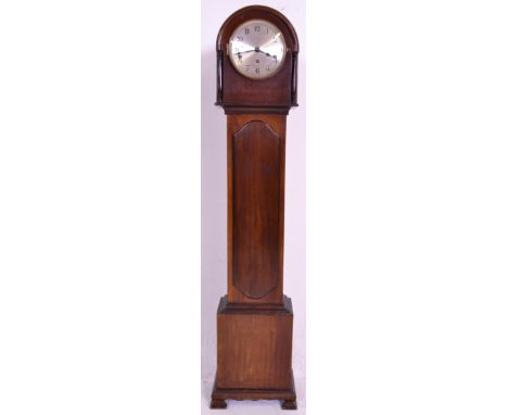 A 20th Century 1930's / 40's Art Deco mahogany cased granddaughter clock. The clock having a&nbsp;silvered dial with Arabic n