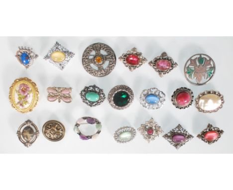 A selection of 20 assorted fashion jewellery brooches to include a celtic knot brooch set with an orange stone, a mother of p