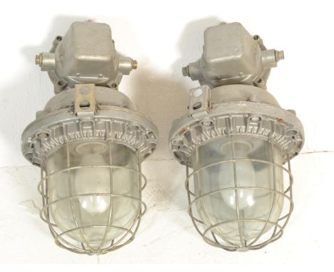 A pair of oversized large Industrial ' Extreme Condition ' bulkhead pendant lights having galvanised metal brackets with larg