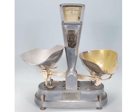 A set of retro mid century sweet shop scales ' The Verity ' by Vandomes of London. The metal scales with tapering column meas