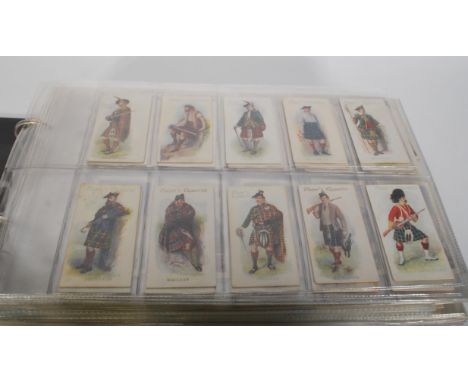 An album of vintage John Players cigarette trade cards. Full sets include Highland Clans, Speedway Riders, Poultry, Gilbert &