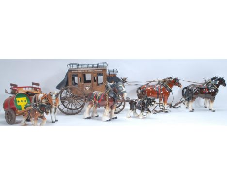 A mixed collection of vintage 20th Century horses and wagons / stagecoaches in the manner of Beswick to include a U.S Mail ca