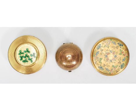 A group of vintage 20th Century compacts to include a Pygmalion No. 21960 of orb form having decorative engraved floral patte