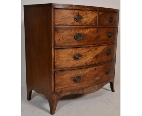 A good 19th Century Georgian mahogany chest of drawers raised splayed bracket feet supports having two short over three long 