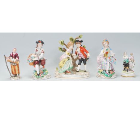 A good group of 19th Century and later porcelain Dresden style figures to include a young courting couple with the lady being