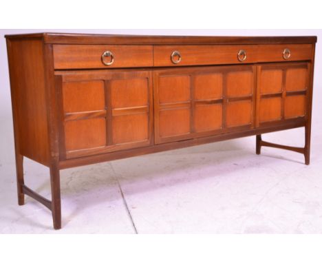 A 20th Century 1970's retro Nathan Long John teak wood sideboard credenza raised on shaped legs having quarter panel cupboard