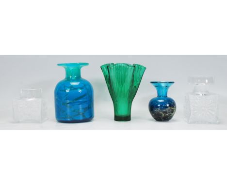 A good collection of mid 20th century vintage glass vases to include two Mdina examples, two Dartington vases and a green vas