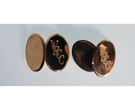 A pair of gents 9ct gold hallmarked cufflinks of oval disc form, engraved with the initials WHC, housed within jewellery case