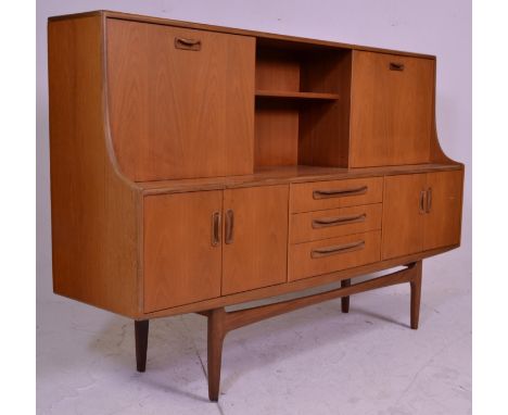 A retro 20th Century 1970's G-Plan teak highboard / sideboard&nbsp;credenza in the Fresco range. Raised on tapering legs with