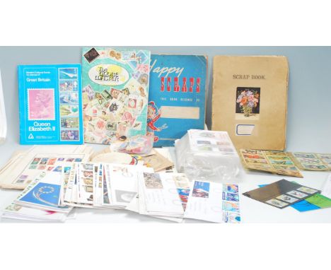 A collection of various first day cover stamps with some loose examples with many on envelopes, unused examples with some sti