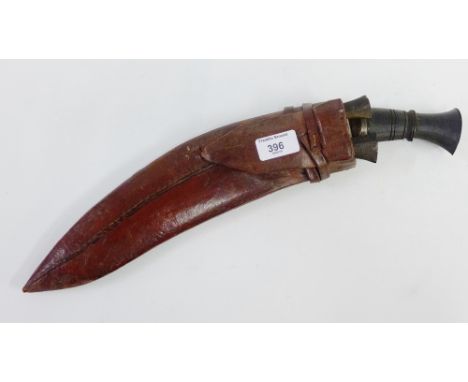 Kukri with leather scabbard and two additional short knives
