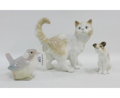 Two Lladro figures to include a Vagabond dog, modelled by Juan Huerta and a Lladro bird, together with a NAO cat, tallest 14c