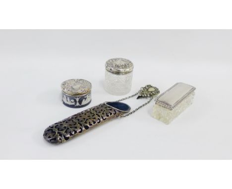 A mixed lot to include two silver topped toilet jars, Wedgwood trinket box with silver lid and an Epns spectacles case (a lot