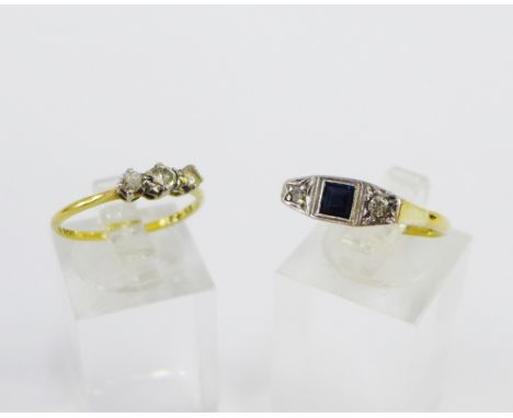 18 carat gold and platinum three stone diamond dress ring together with an 18 carat gold sapphire and diamond dress ring (2) 