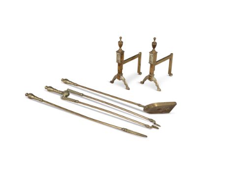 A SET OF BRASS FIRE TOOLS COMPRISING:Two andirons, tongs, shovel, poker, the andirons: 32cm high