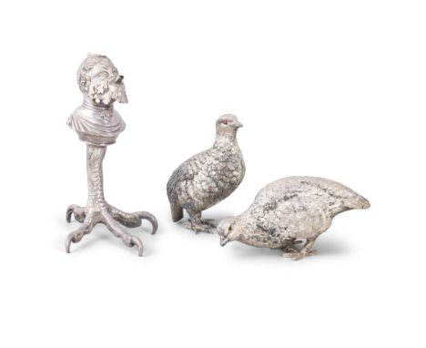 AN UNUSUAL ITALIAN SILVER PLATED OIL LAMP, 19TH CENTURYcast in the form of a satyr head holding a torch from his mouth and su