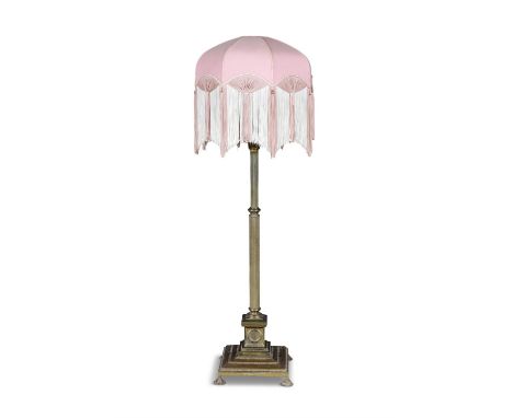A BRASS CORINTHIAN COLUMN FLOOR LAMP, 145cm high, excluding fitments(E)ELECTRICAL GOOD IN NEED OF REWIRING ARE INDICATED BY T
