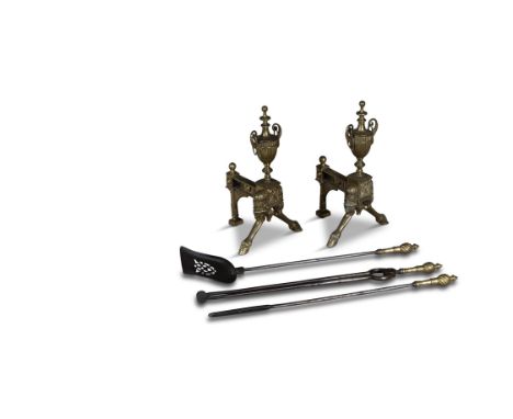 A PAIR OF CAST BRASS ANDIRONS, 19TH CENTURY, of Classical design, with fluted urn and splayed legs with hoof feet, 45cm high;