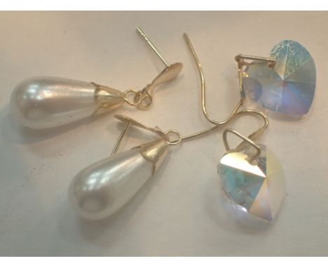 Two pairs of 9ct gold earrings one pearl and one crystal