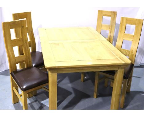 Contemporary light oak extending dining table with four oak leatherette chairs, 200 x 90 x 79 cm H (extended). Not available 