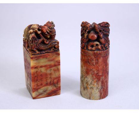 TWO GOOD 19TH CENTURY CHINESE CARVED SOAPSTONE SCROLL WEIGHTS , the carved weights both carved to depict dragons, the sides o