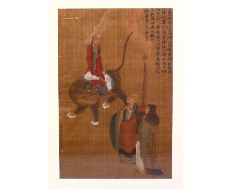 A GOOD 19TH CENTURY CHINESE PAINTED SILK SCROLL PAINTING - FRAMED, depicting a figure upon a tiger before two other figures, 