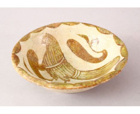 A GOOD ISLAMIC ABBASID POTTERY BOWL, with a light glaze decorated with birds, 14cm.