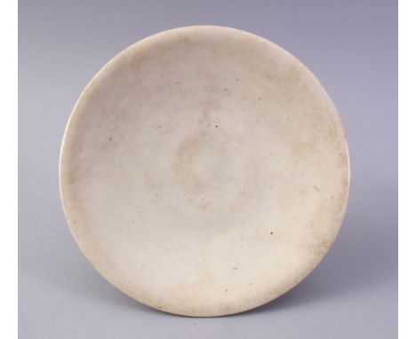 A GOOD CHINESE 18TH CENTURY OR LATER CRACKLE GLAZE DISH / PLATE, the base with an illegible impressed seal mark, 20cm.