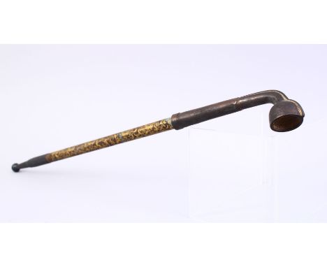 A LARGE CHINESE METAL AND GILT OPIUM PIPE, with gilt decoration through the cental section 47cm.