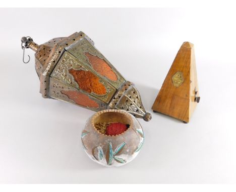 A collection of items, to include a French walnut metronome, a bronzed metal and brown stained Middle Eastern style lantern a