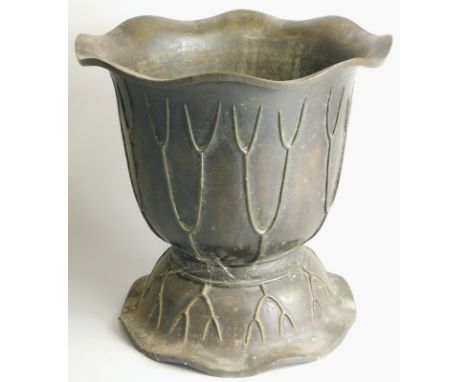 An oriental bronze planter, of foliate form, 30cm high.