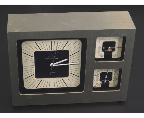 A 1970's Jaeger Le Coultre electric desk or table clock/weather station, the rectangular brushed steel type case housing a sq