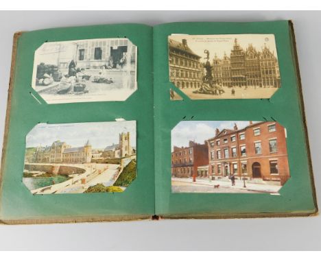 Suffragette interest.  A postcard album, including a mixture of topographical, humorous, seaside, portrait and other postcard
