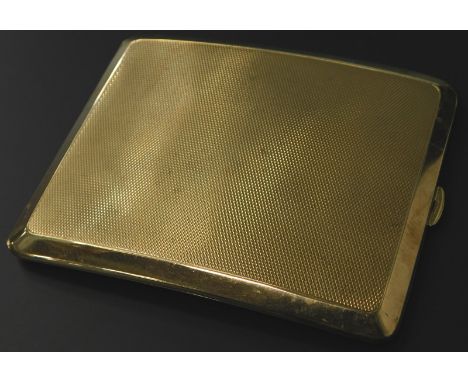 A George V 9ct gold cigarette case, the engine turned body, with thumb press handle, partially curved hinging to reveal a pla