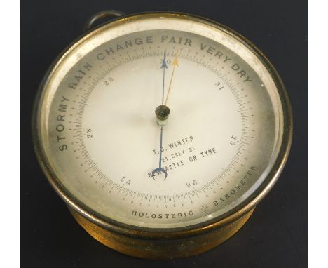 An early 20thC PHBN holosteric wall barometer, the circular dial with arrow and crescent pointers, signed T B Winter, Newcast