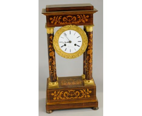 A 19thC French rosewood marquetry portico type mantel clock, decorated overall with scrolls, flowers etc., the enamel dial si