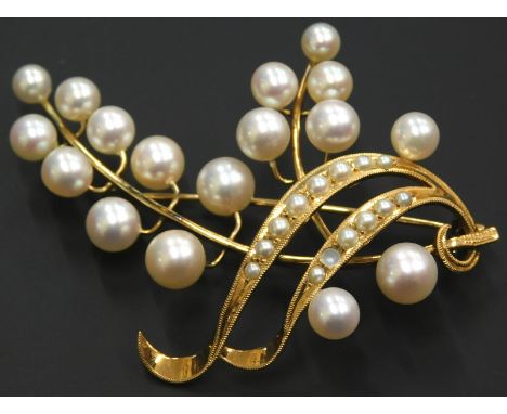 A cultured pearl floral brooch, with two fern spray set with tiny cultured pearls (1 missing), with two sprigs of pearls, yel